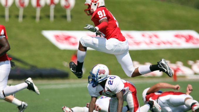 american-football-football-football-player-running-159616